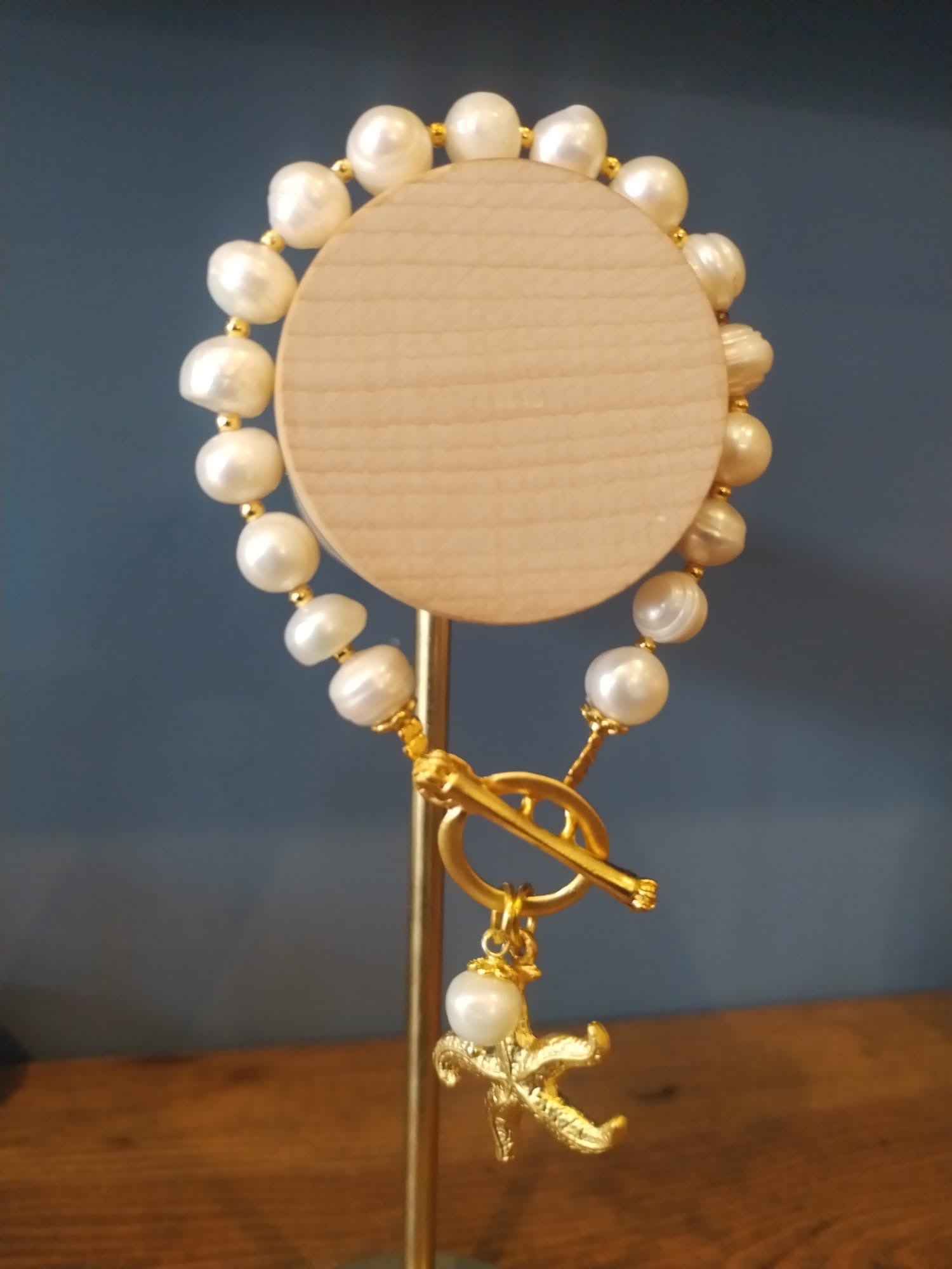 Freshwater Pearl Bracelet with a Gold Starfish Charm