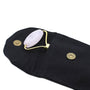 Black pouch with a white roller and gold accents on a white background