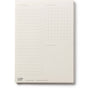 Notebook with grid and ruled paper on a white background, featuring 'Coffee Notes' branding.