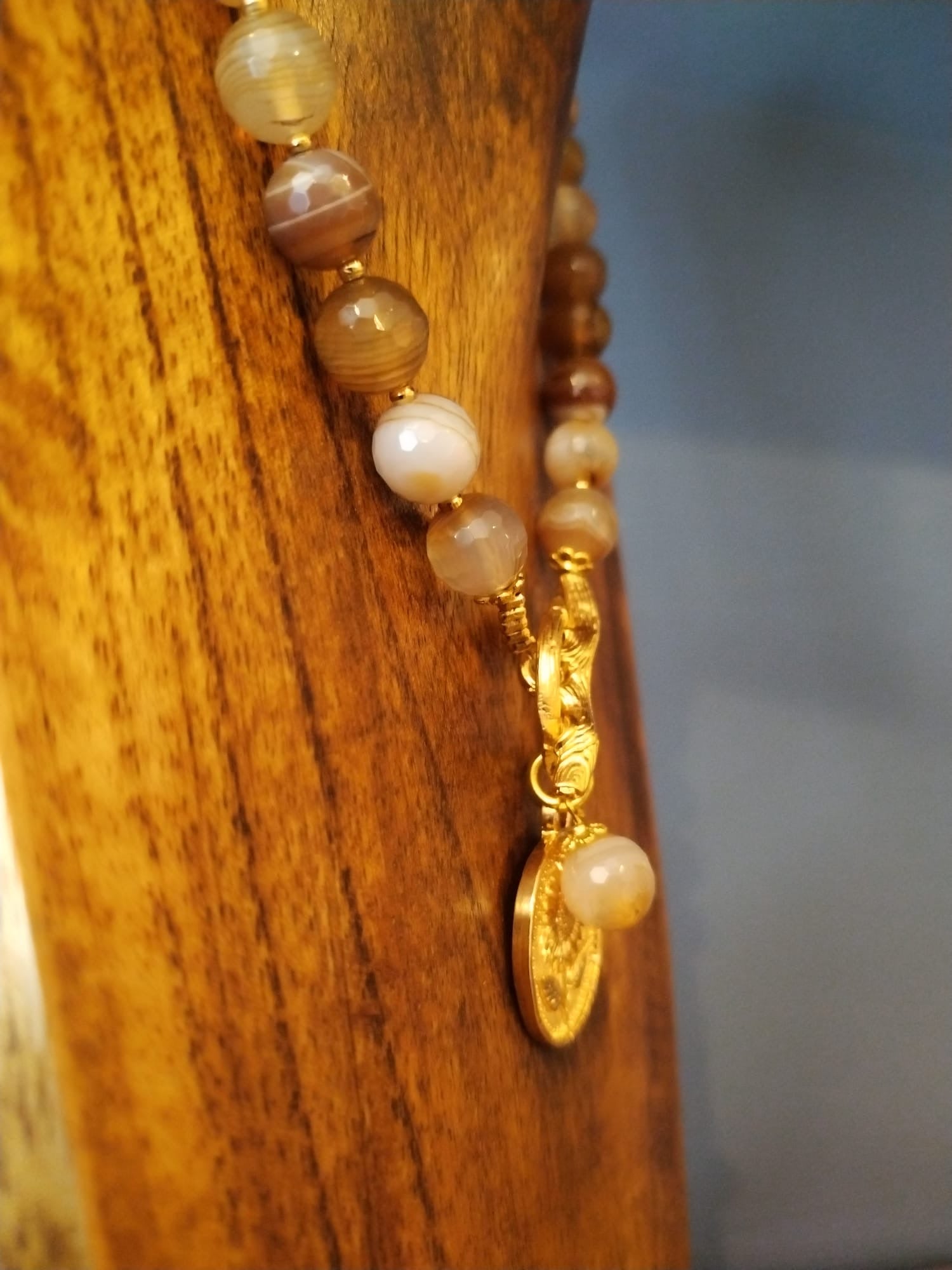 Elegant Brown Striped Agate Necklace With Gold Flower Charm