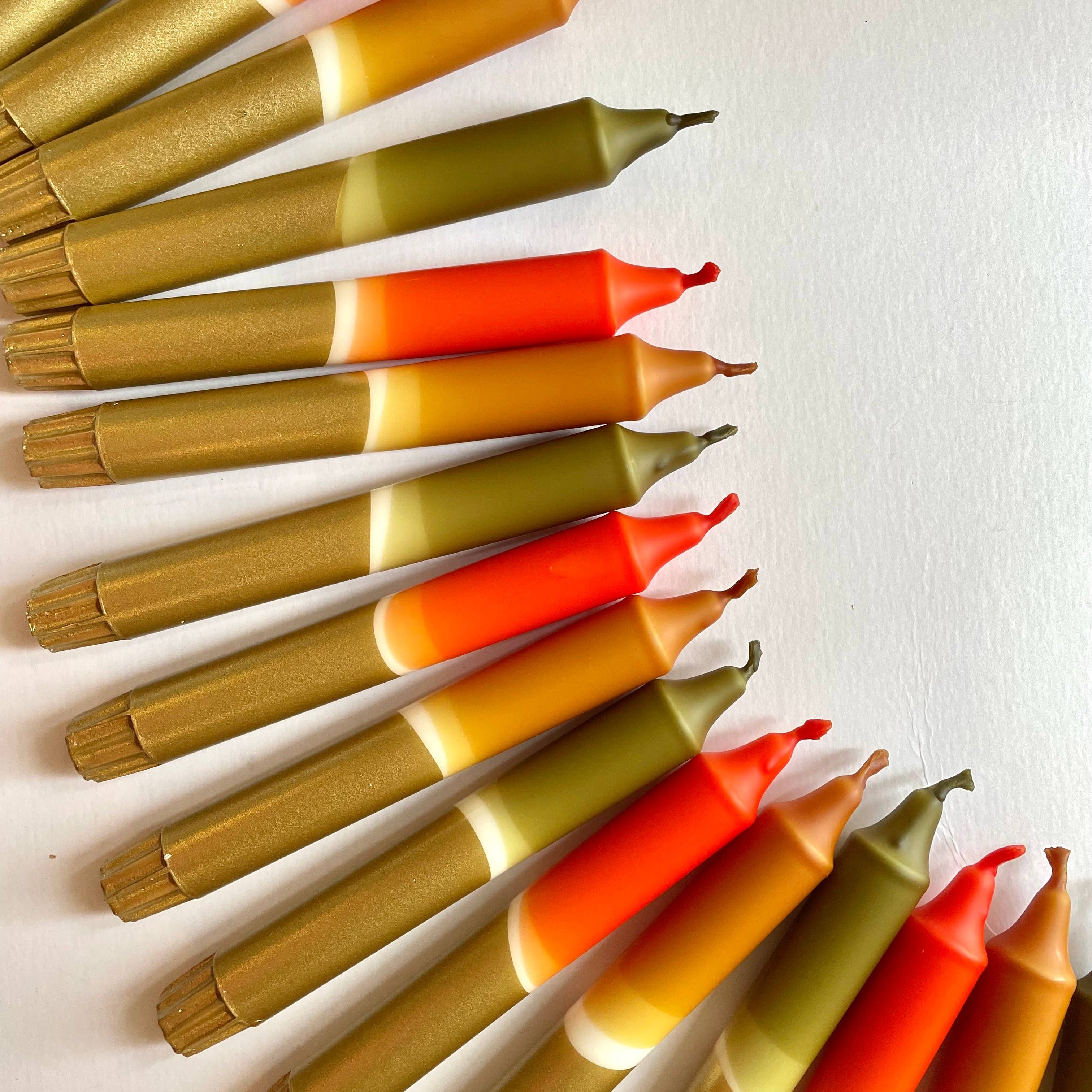 Set of colorful markers arranged in a circular pattern on a white background