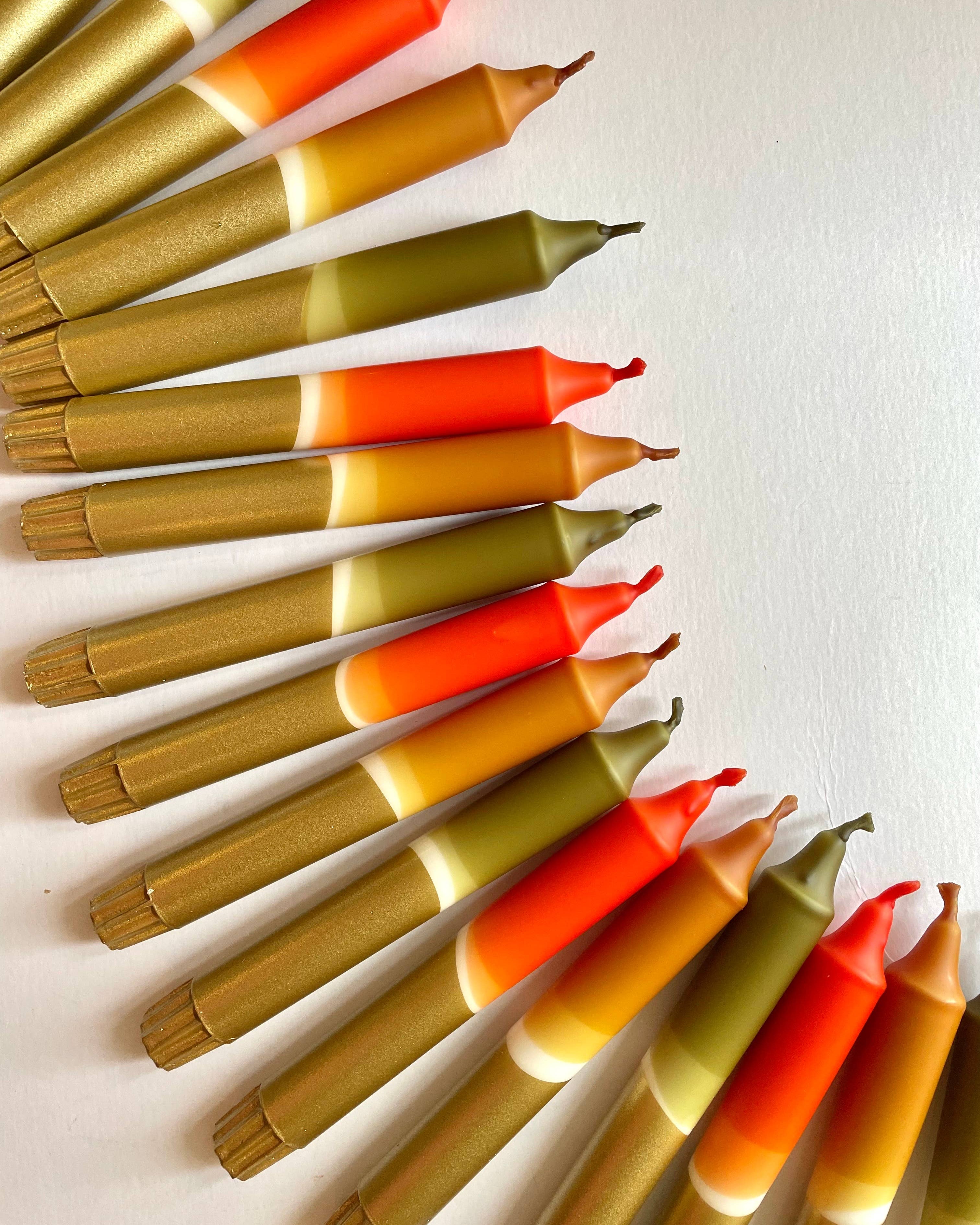 Set of colorful markers arranged in a circular pattern on a white background