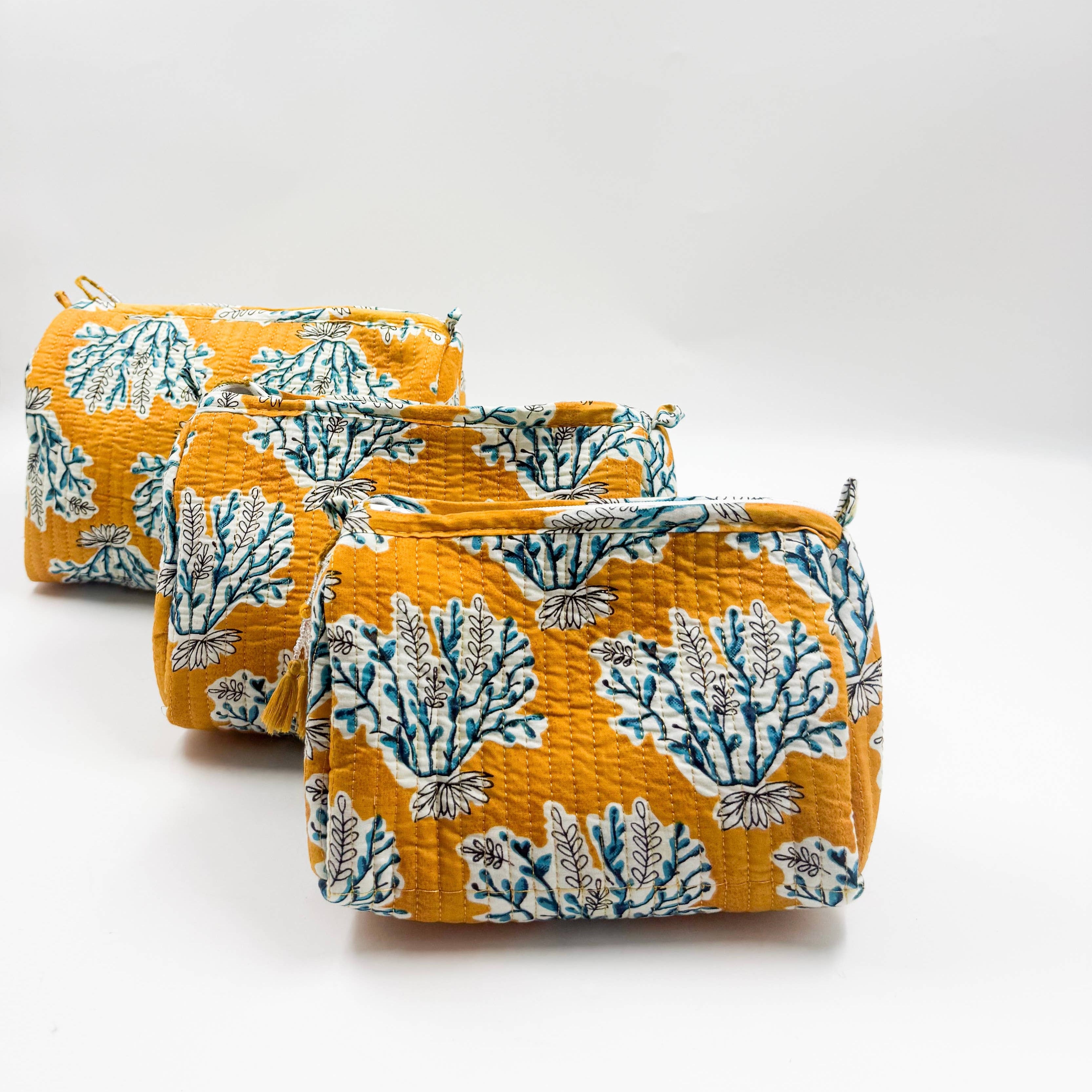 Set of Three Quilted Wash Bags in  Golden Yellow With Blue Floral Print