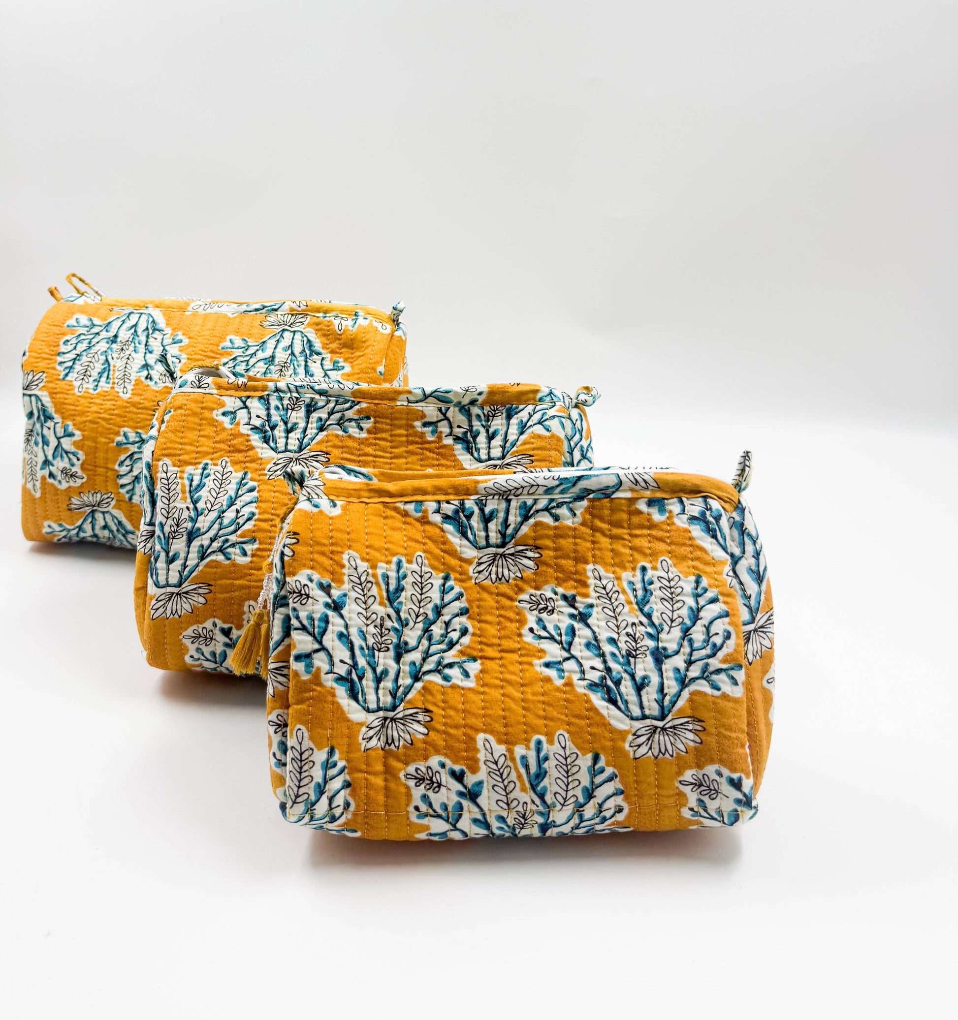 Set of Three Quilted Wash Bags in  Golden Yellow With Blue Floral Print