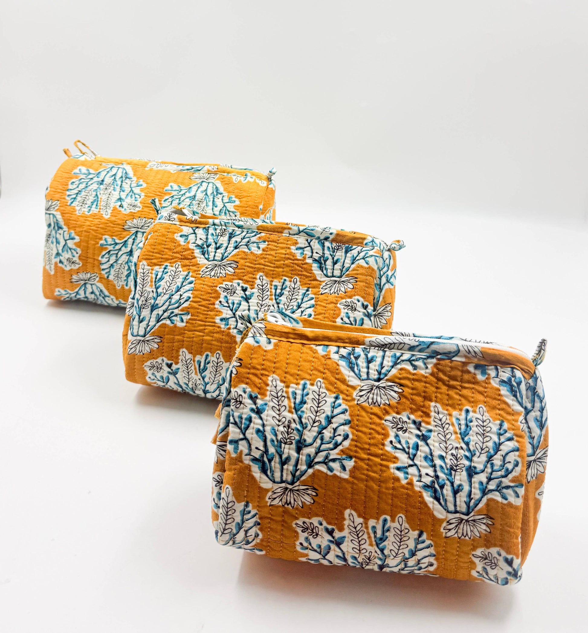 Set of Three Quilted Wash Bags in  Golden Yellow With Blue Floral Print