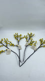 Decorative branches with small yellow flowers on a white background
