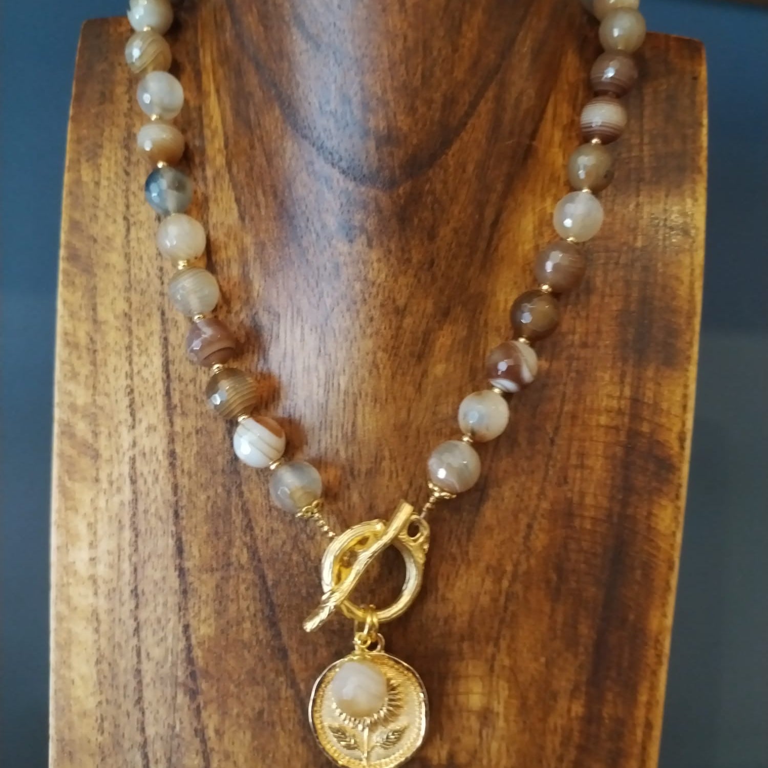 Elegant Brown Striped Agate Necklace With Gold Flower Charm