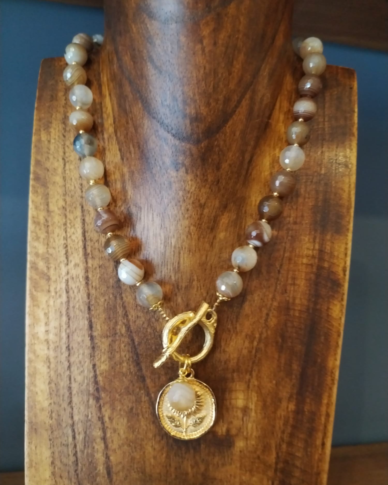 Elegant Brown Striped Agate Necklace With Gold Flower Charm
