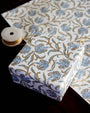 Decorative box with floral pattern on a matching fabric background
