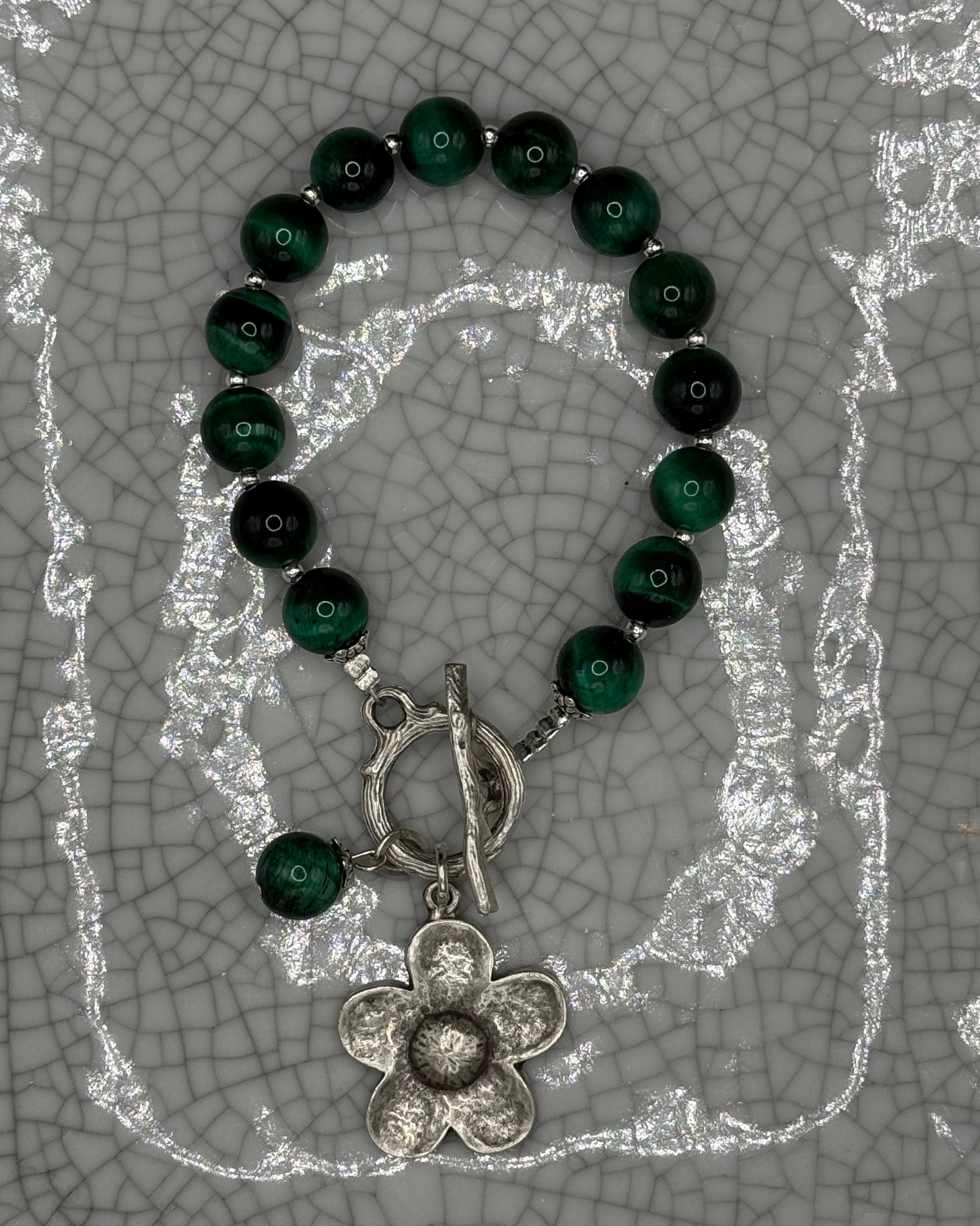 Green tiger's eye bead bracelet with silver flower charm, tiger's eye drop and T-bar clasp, handmade in Bristol
