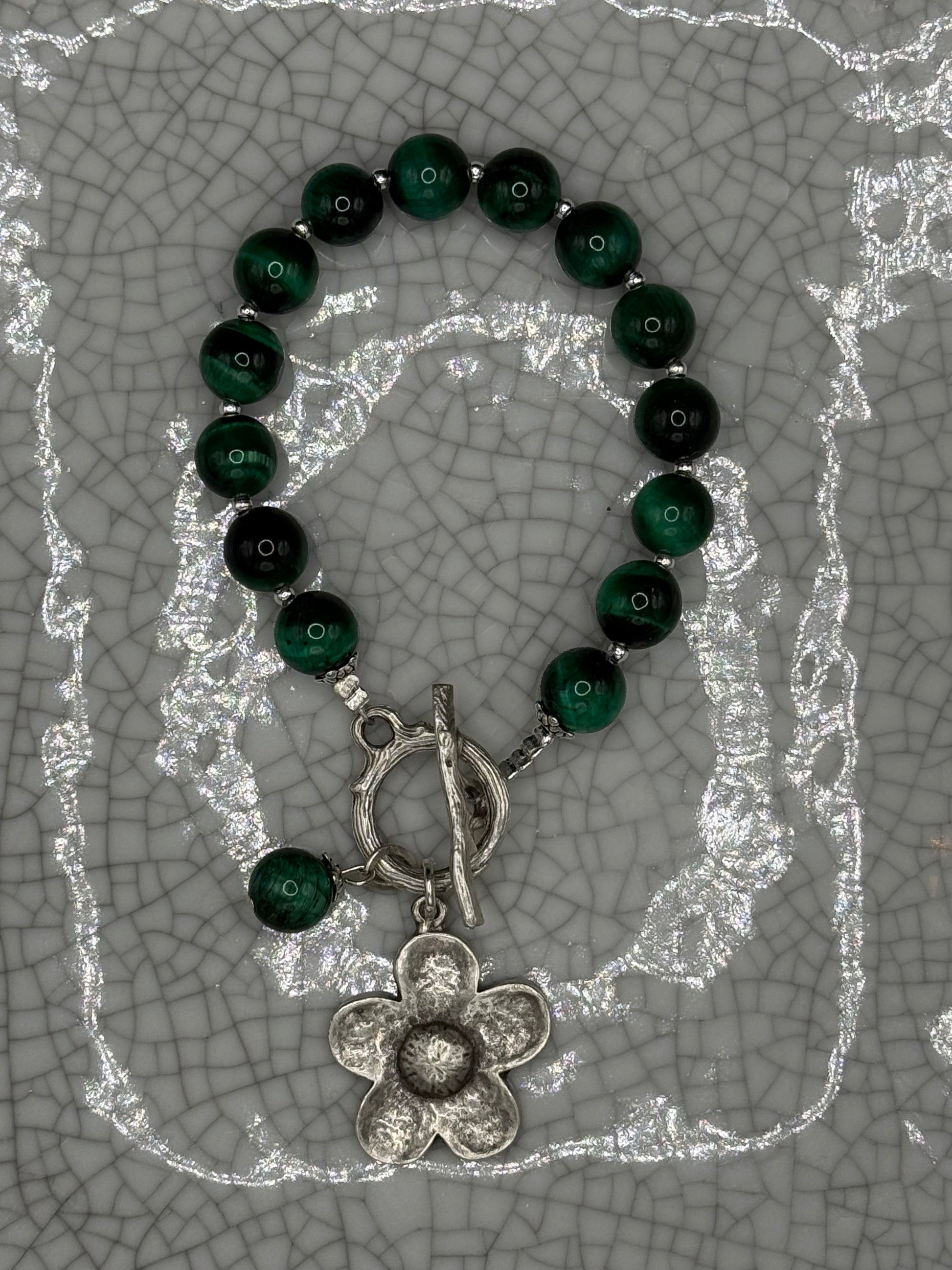 Green tiger's eye bead bracelet with silver flower charm, tiger's eye drop and T-bar clasp, handmade in Bristol