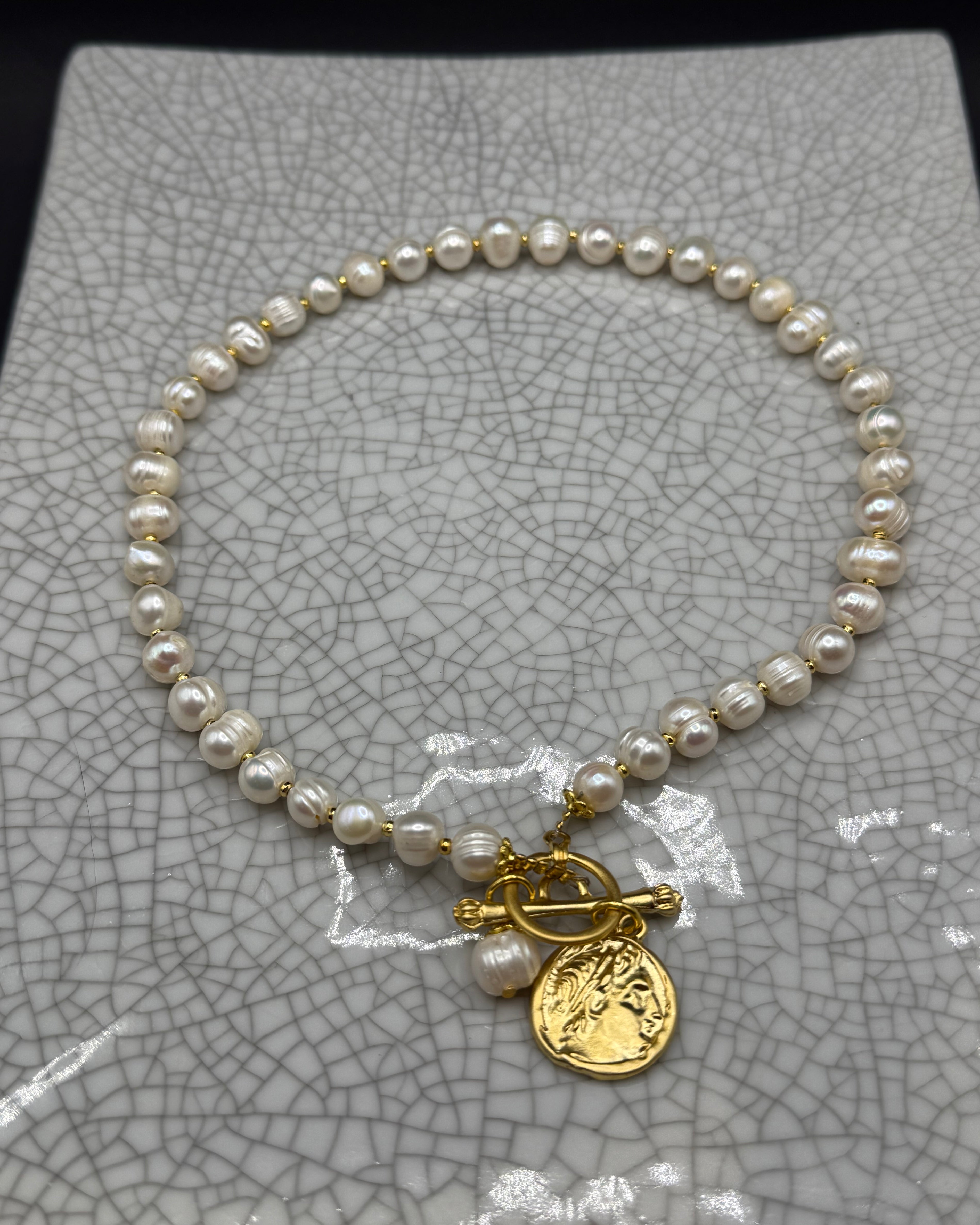Freshwater pearl necklace with gold spacers, gold Roman coin charm, pearl drop and front T-bar clasp, handmade in Bristol