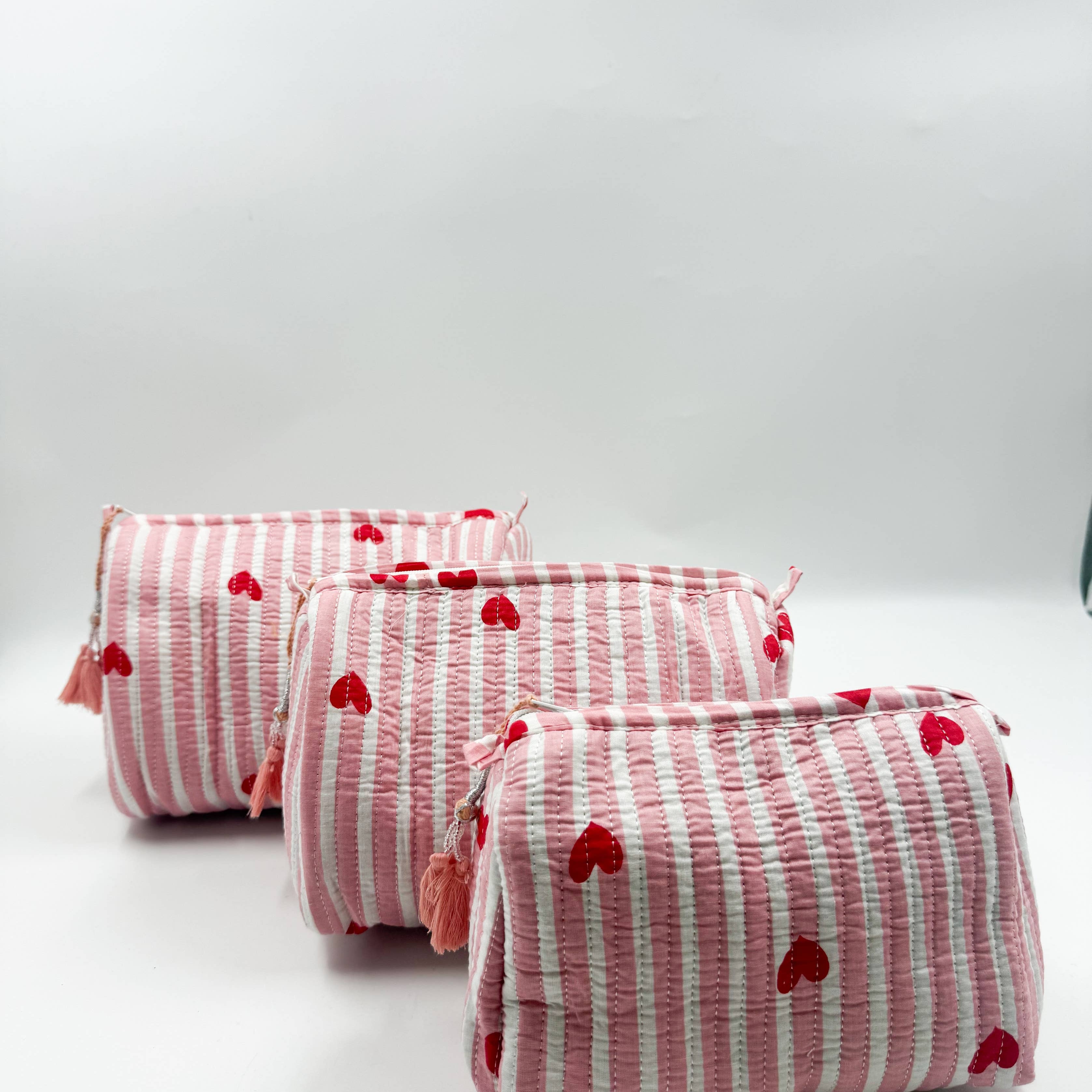 Set of Three Quilted Wash Bags with Pink Stripe Heart Print
