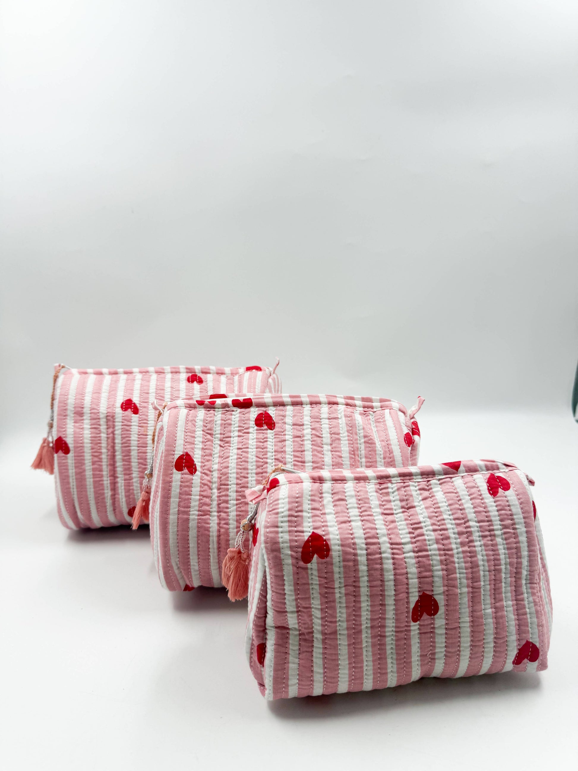 Set of Three Quilted Wash Bags with Pink Stripe Heart Print