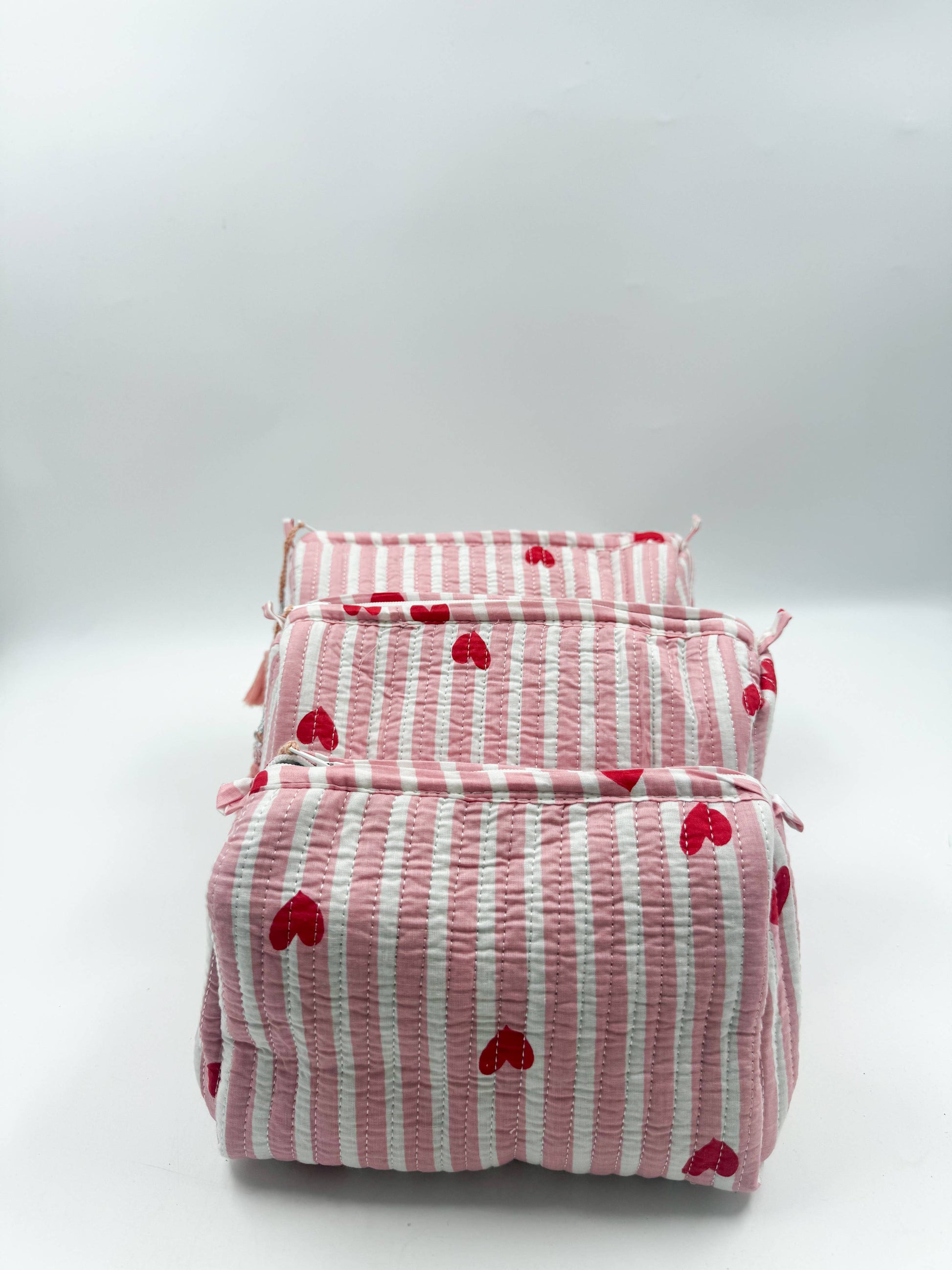 Set of Three Quilted Wash Bags with Pink Stripe Heart Print