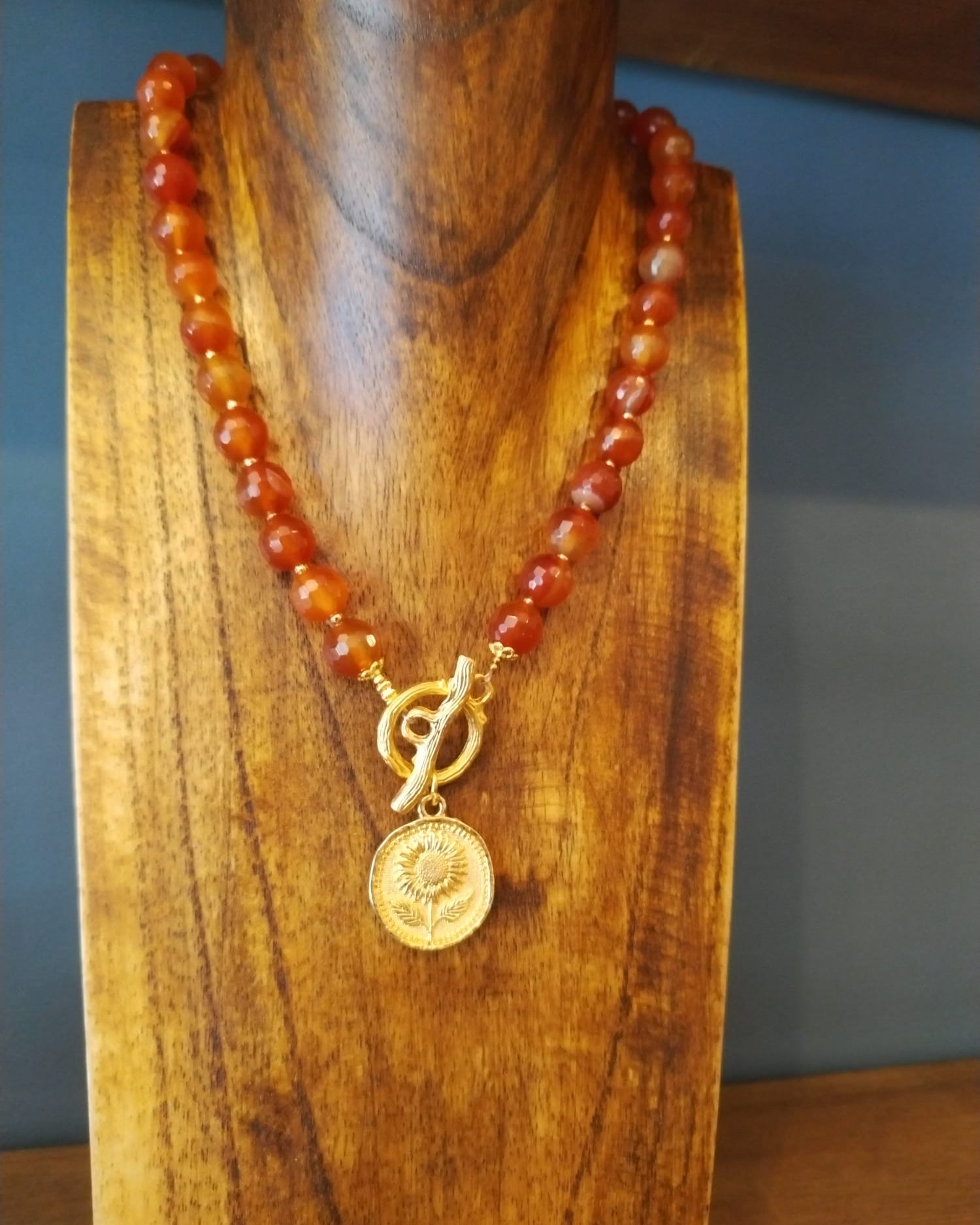 Elegant Carnelian Necklace With Gold Flower Charm