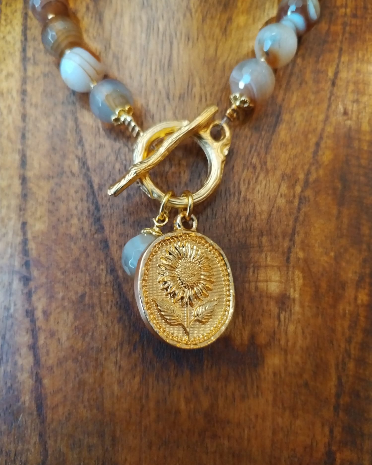 Elegant Brown Striped Agate Necklace With Gold Flower Charm