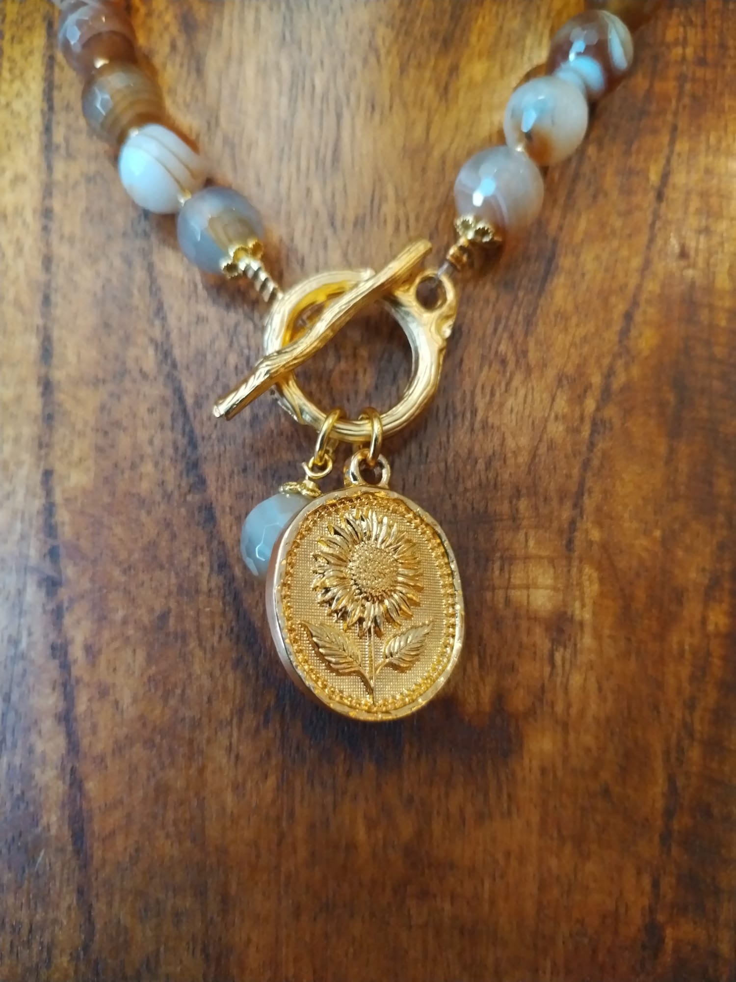 Elegant Brown Striped Agate Necklace With Gold Flower Charm