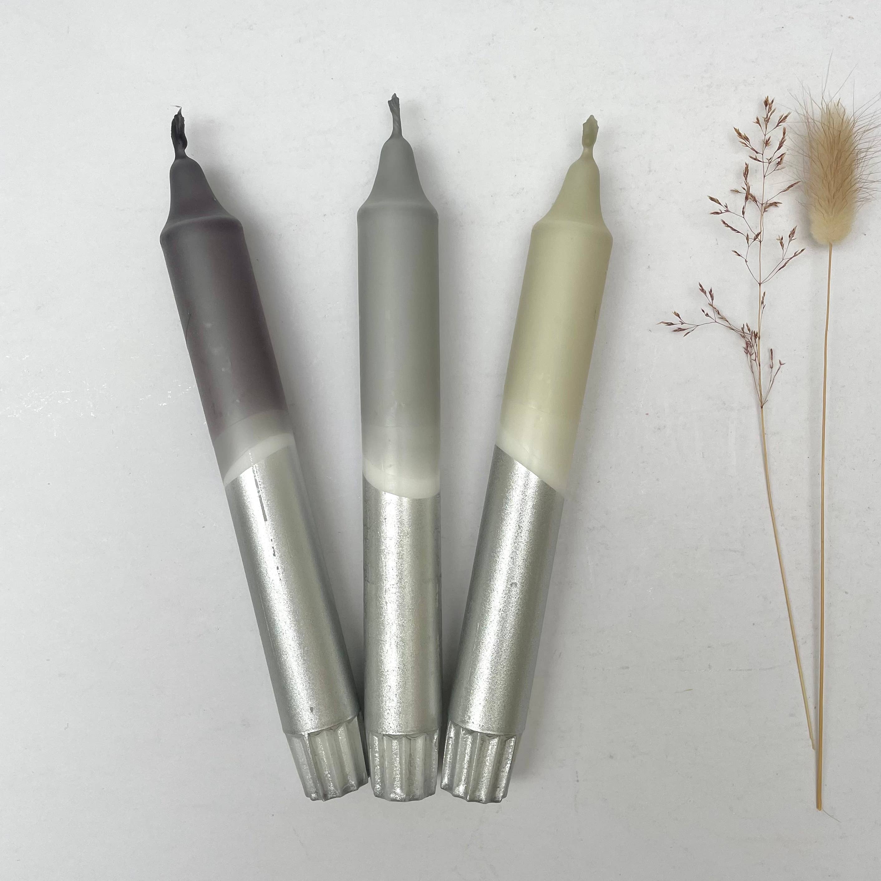 Three markers with gradient colors on a white background