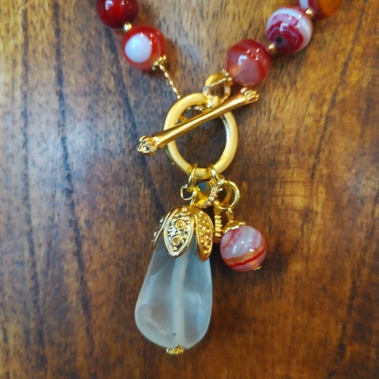 Red Agate Necklace with Quartz Charm and Gold Details 42cm