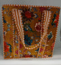 Floral patterned fabric with a striped border on a gray background
