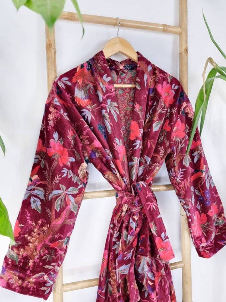 Detail of wine red bird of paradise velvet print