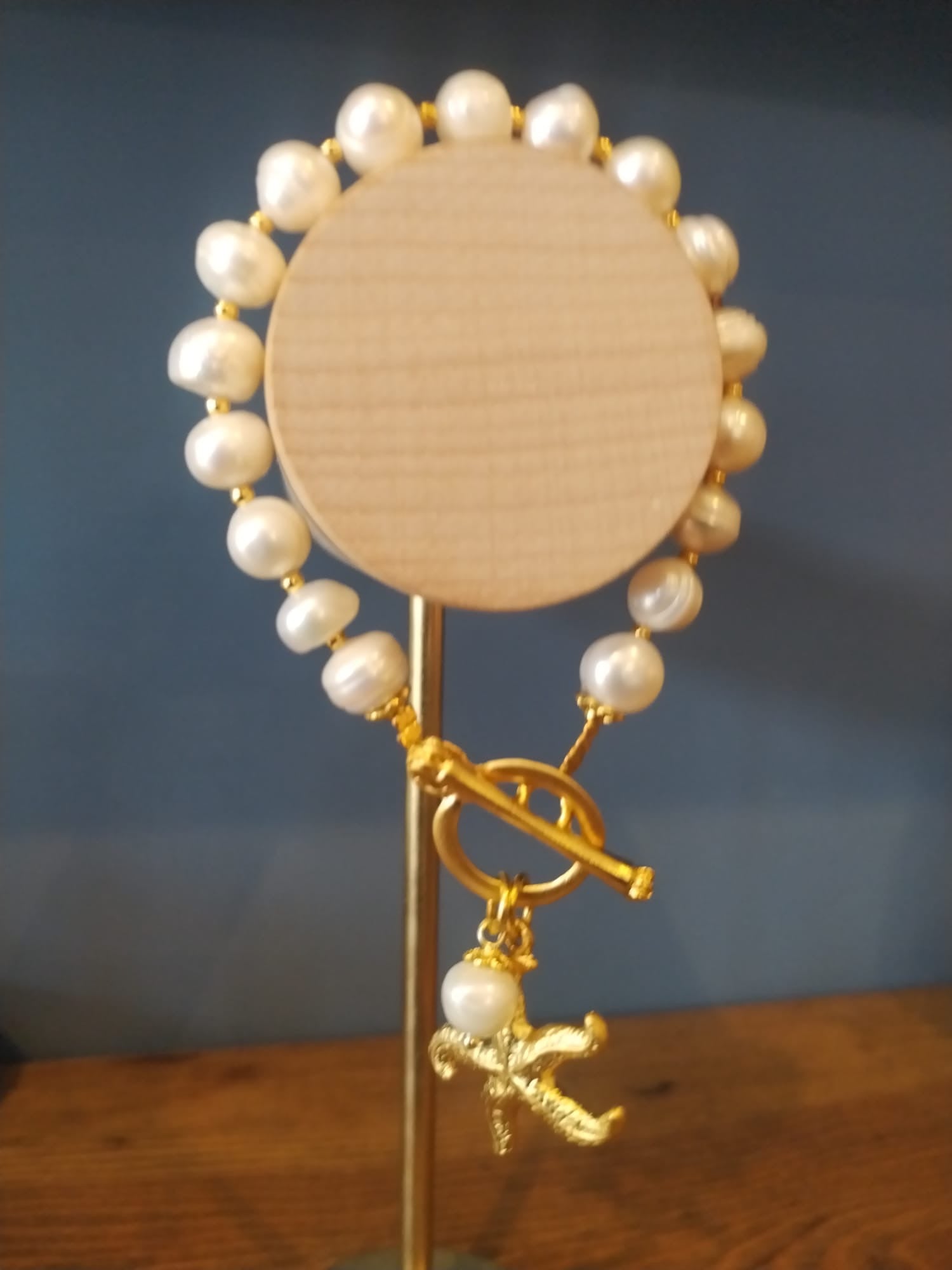 Freshwater Pearl Bracelet with a Gold Starfish Charm
