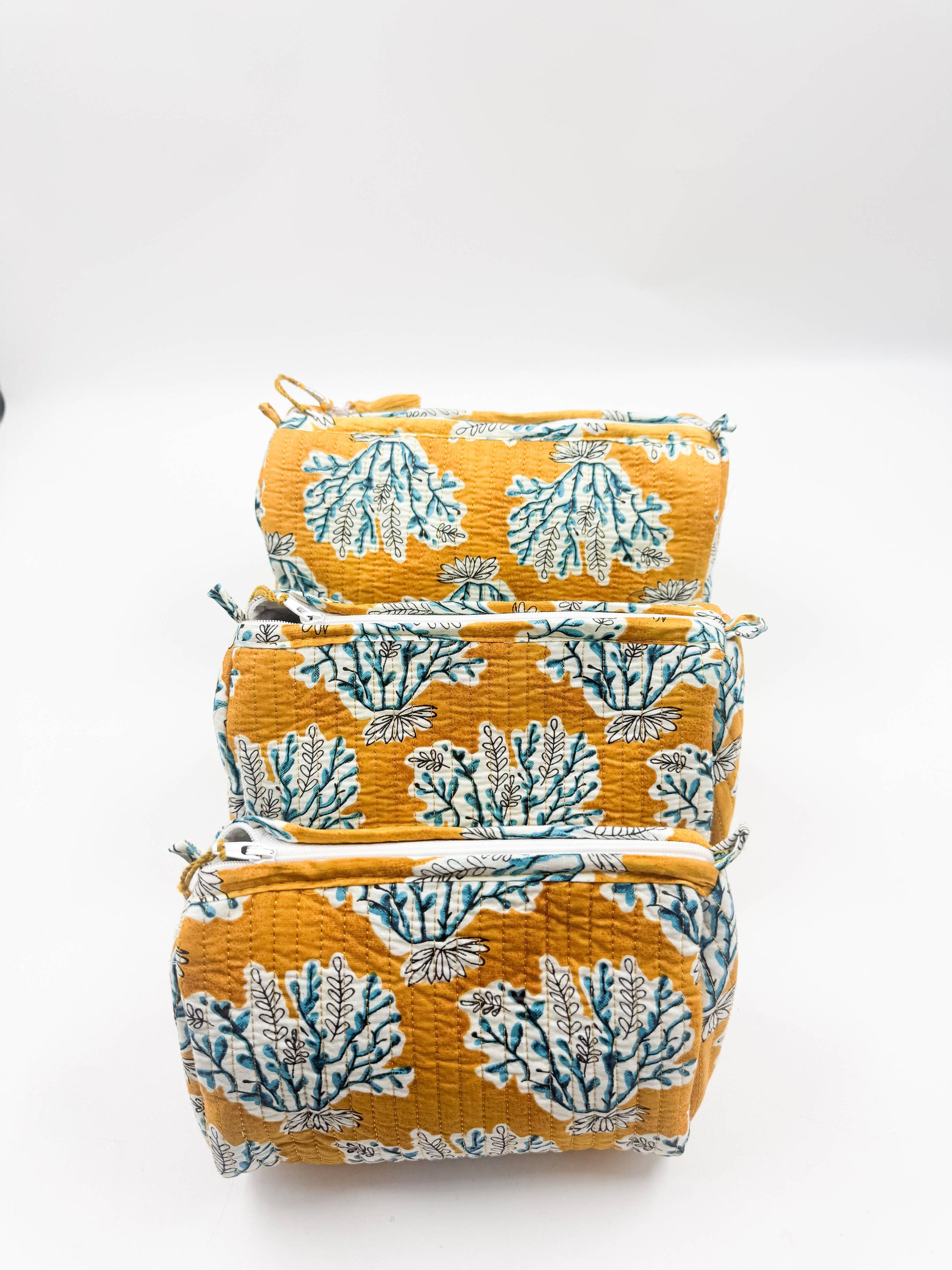 Set of Three Quilted Wash Bags in  Golden Yellow With Blue Floral Print