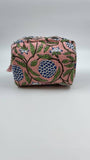 Fabric pouch with floral pattern on a white background
