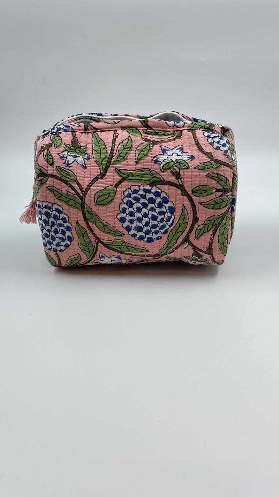 Fabric pouch with floral pattern on a white background