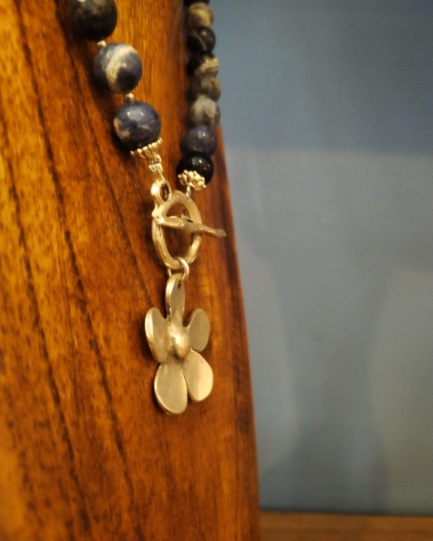 Blue Sodalite Necklace with Silver Flower Charm