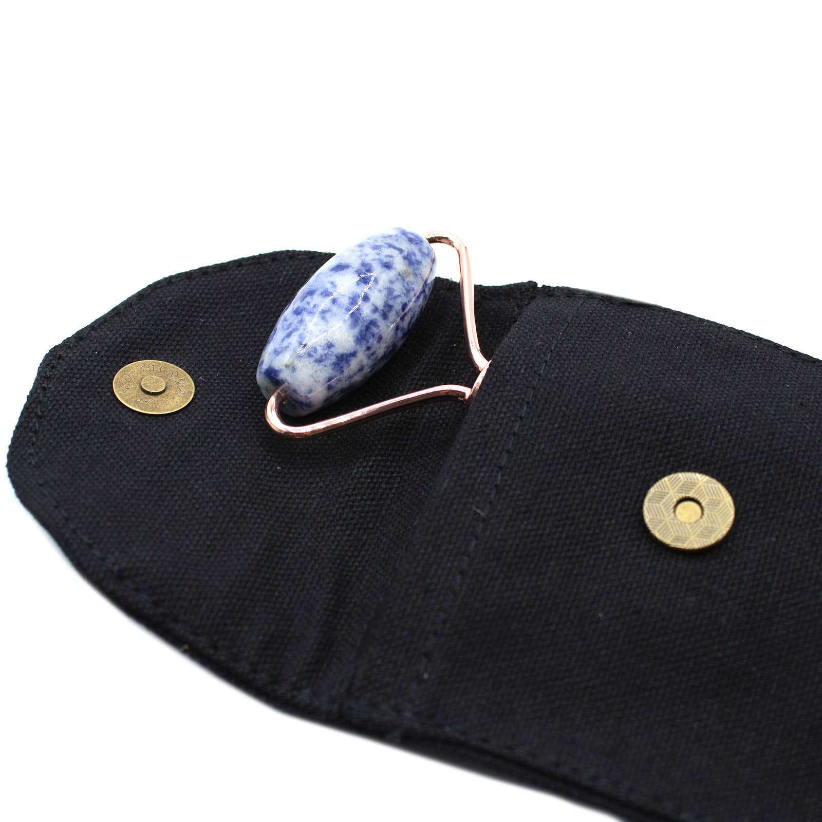 Blue and white roller with gold accents on a black pouch