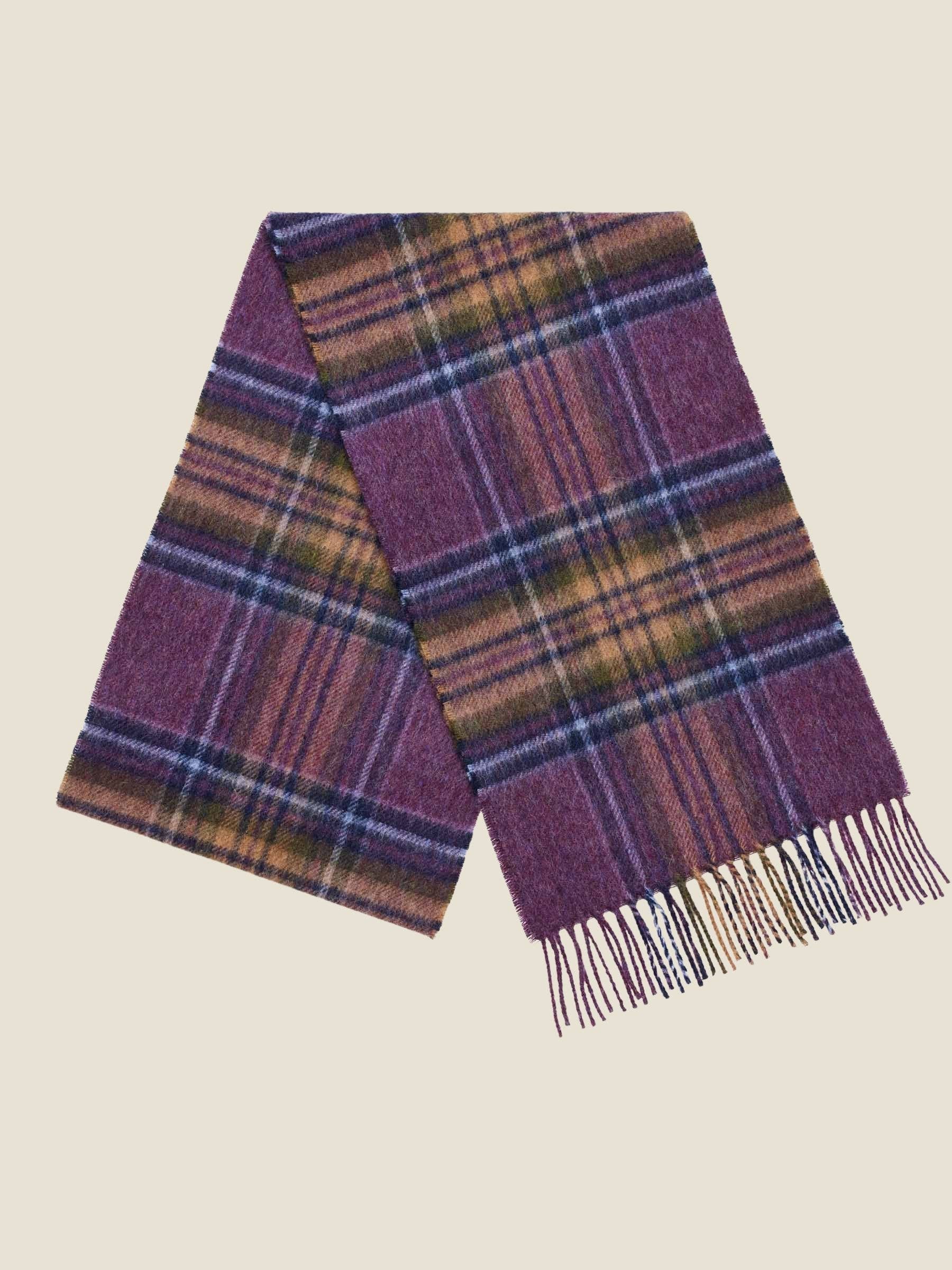 Plaid scarf with purple and brown colors on a beige background