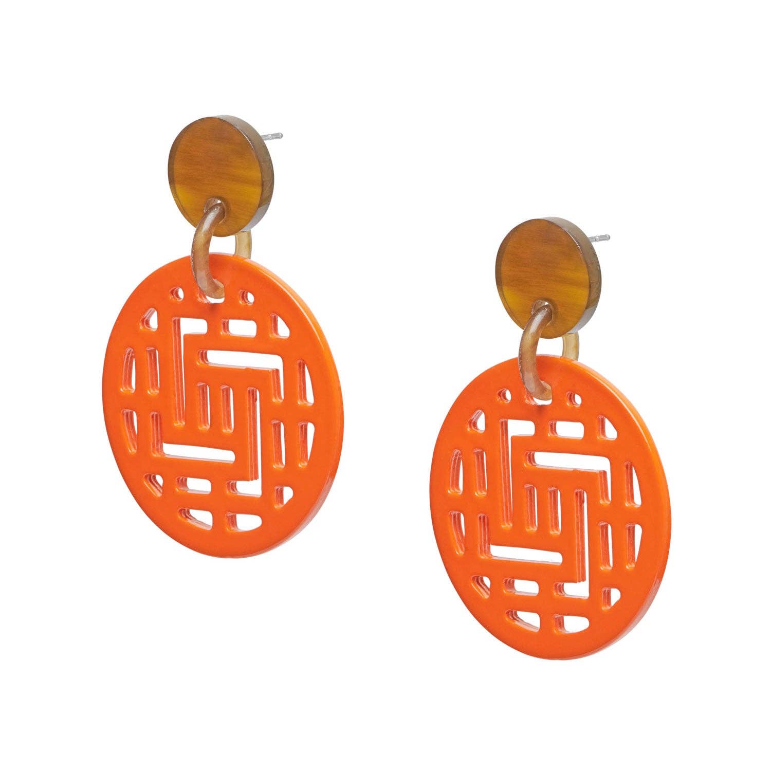 Pair of orange earrings with geometric design on a white background