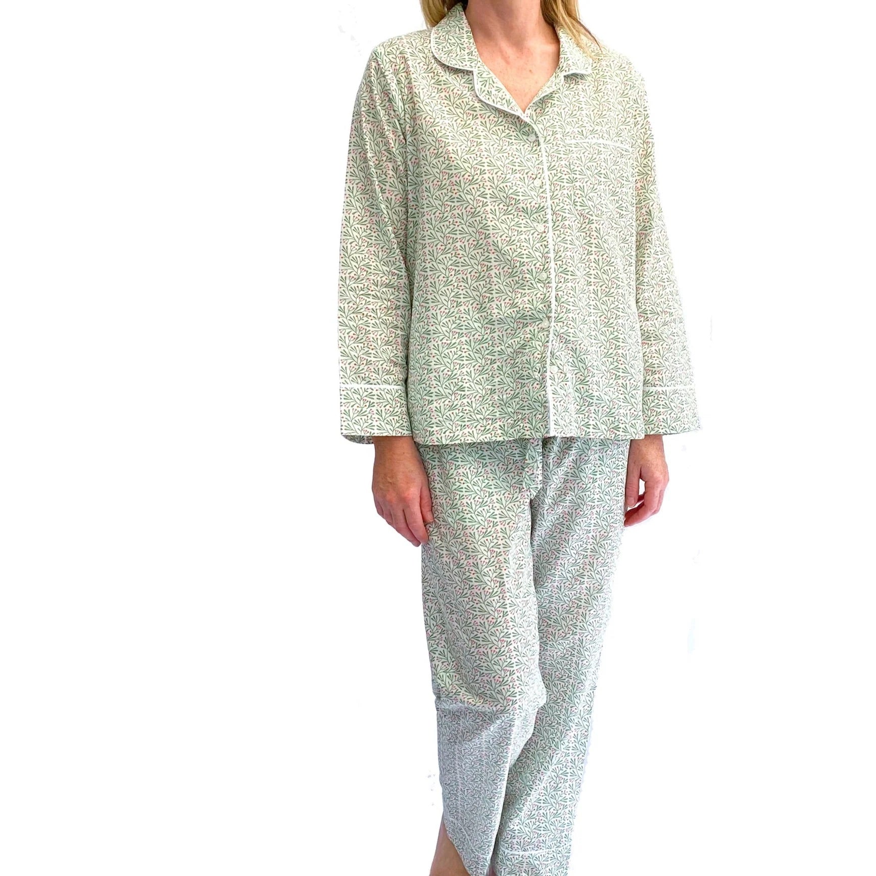 Light green pajama set on a white background