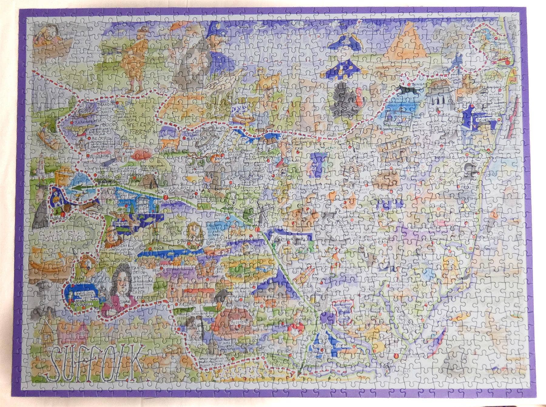 Colorful puzzle with various images on a white background