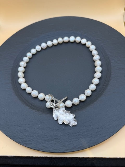 Freshwater pearl necklace with silver oak leaf