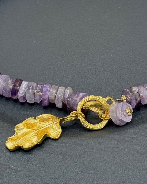 Amethyst tyre bead necklace wit gold clasp