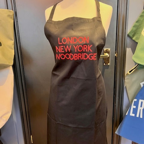 Black Apron, London New York Woodbridge Red Letters