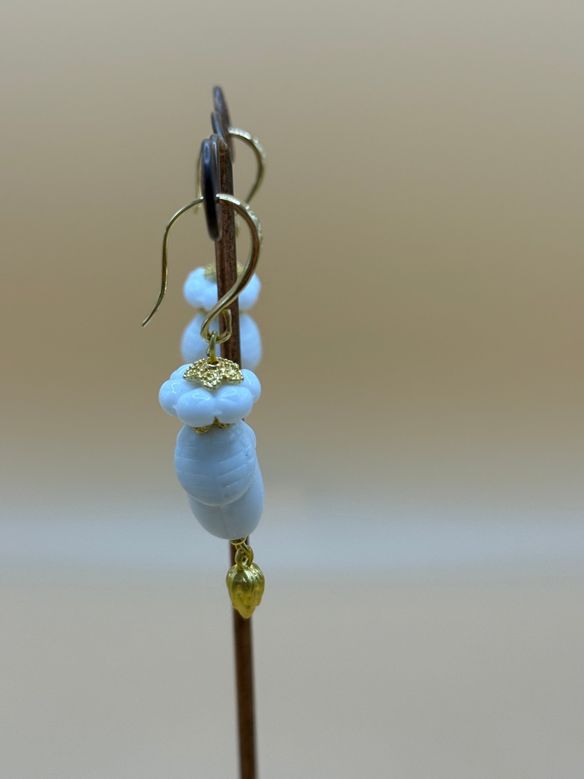 White ceramic botanical bead drop earrings with gold