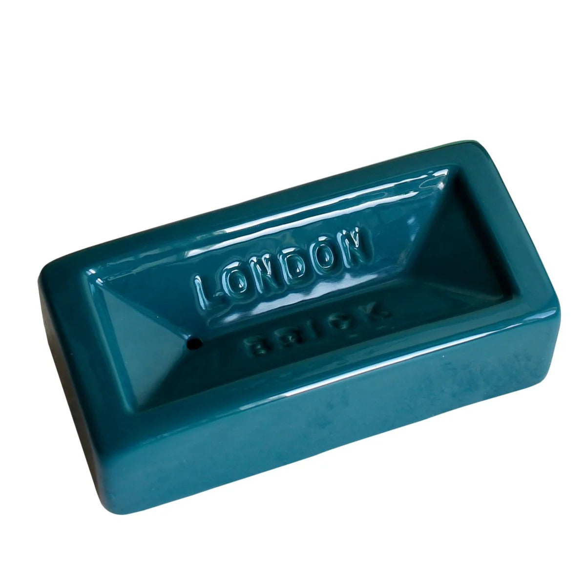 Teal soap dish with 'London' branding on a white background