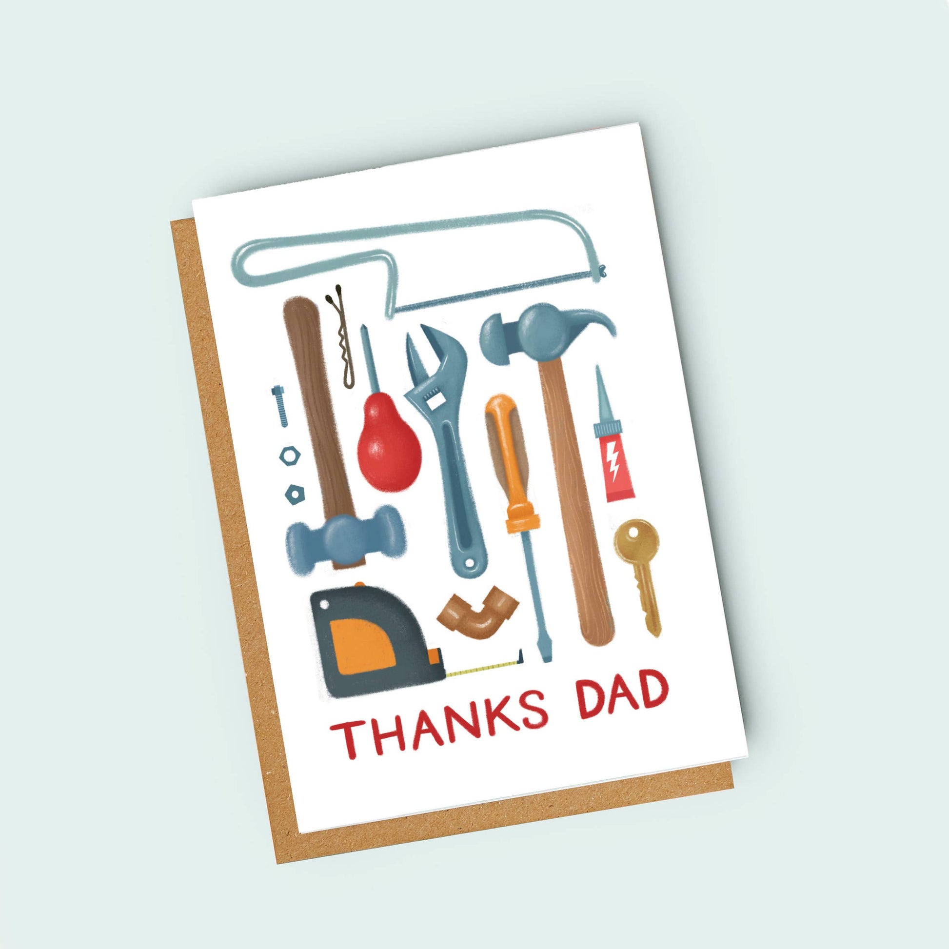 Greeting card with tools illustration and 'Thanks Dad' text on a light blue background