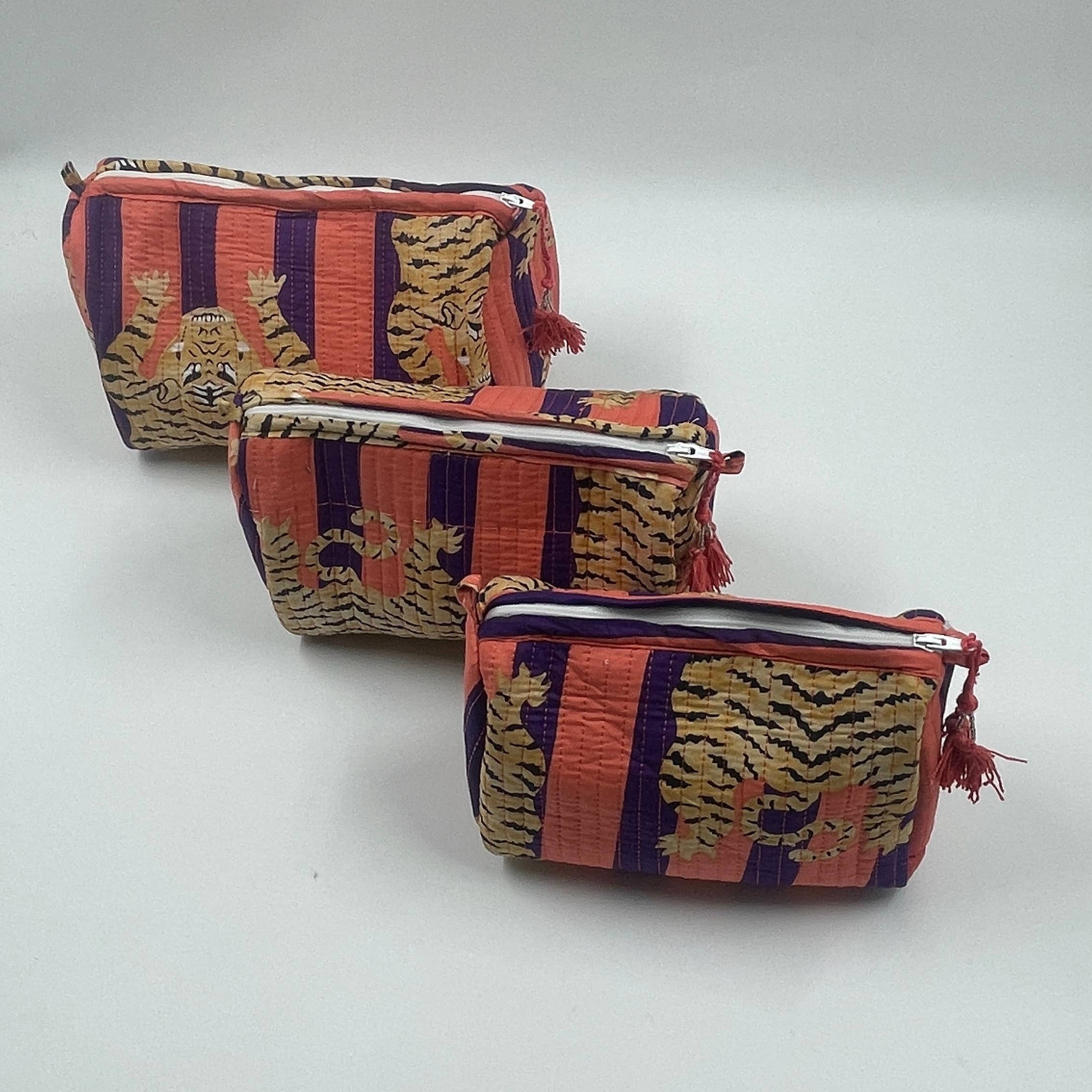 Tiger print cotton  quilted wash bag . Set of three