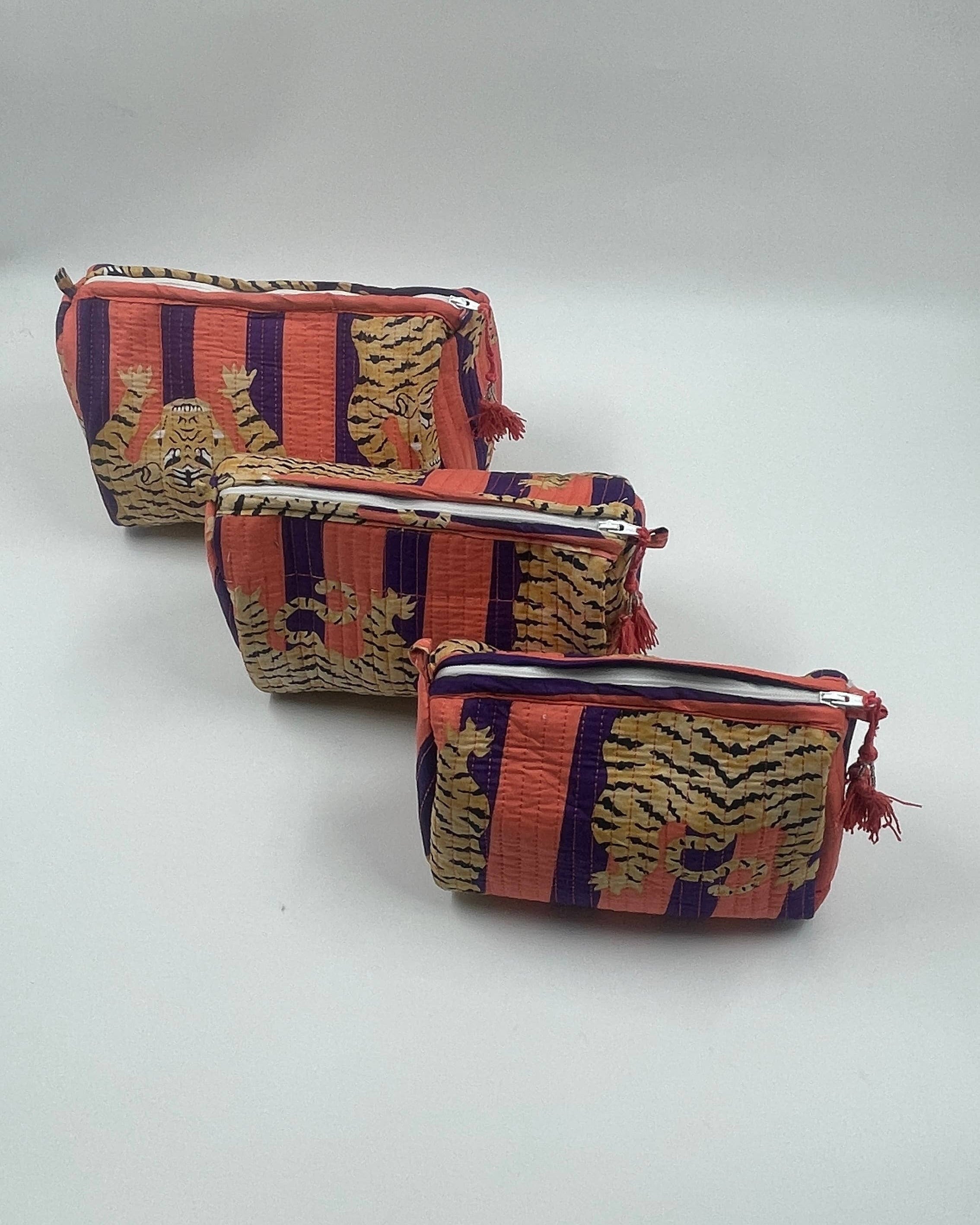 Tiger print cotton  quilted wash bag . Set of three