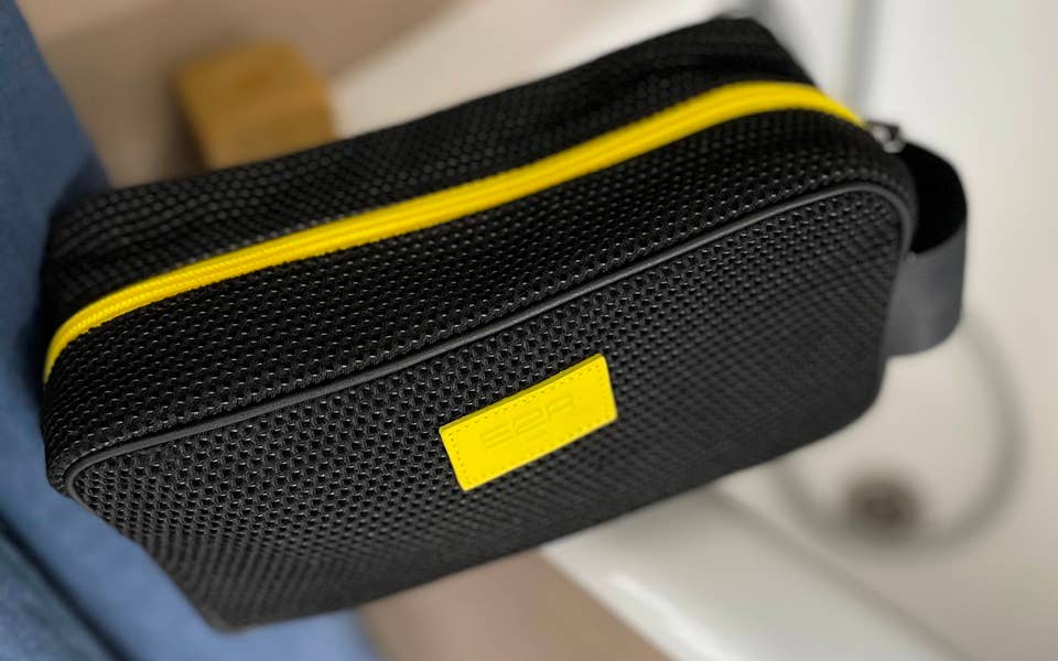Black Toiletry Bag with white, yellow, grey leather stripes