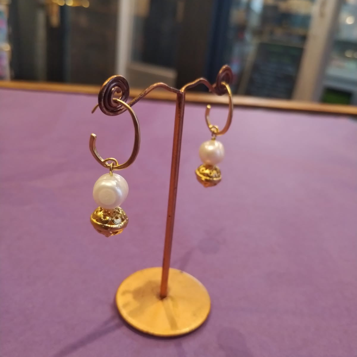 Pearl over gold ball drop earrings