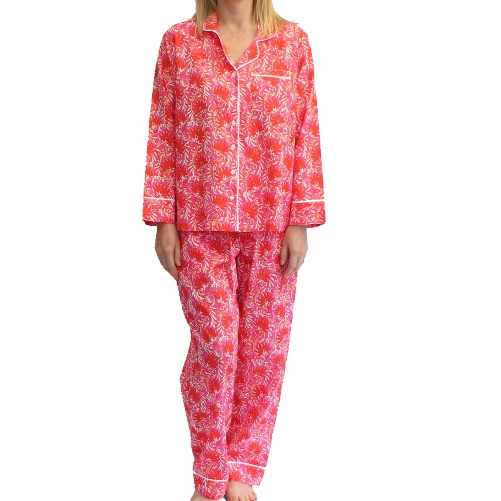 Red floral pajama set on a white background