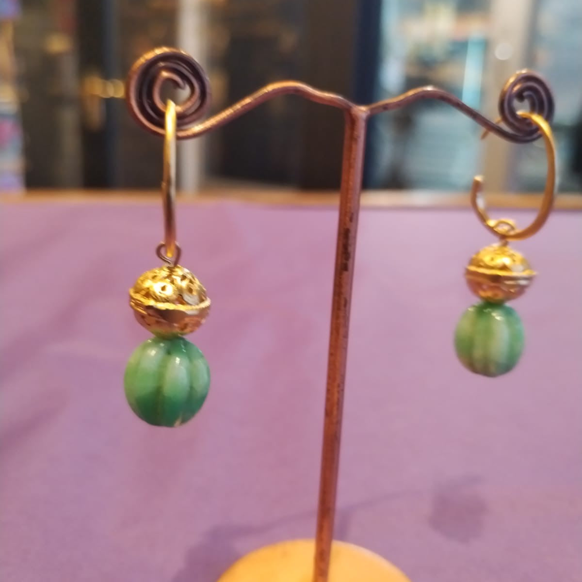Green bead & gold drop earrings