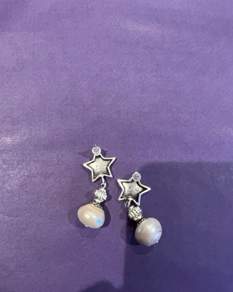 Pearl, silver star earrings