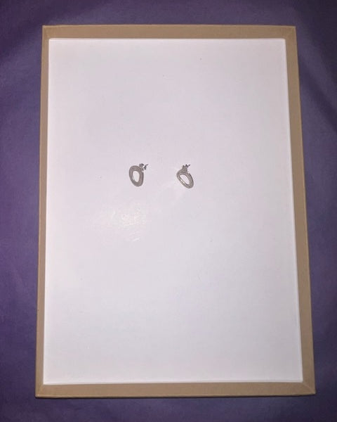 Small irregular hoop studs